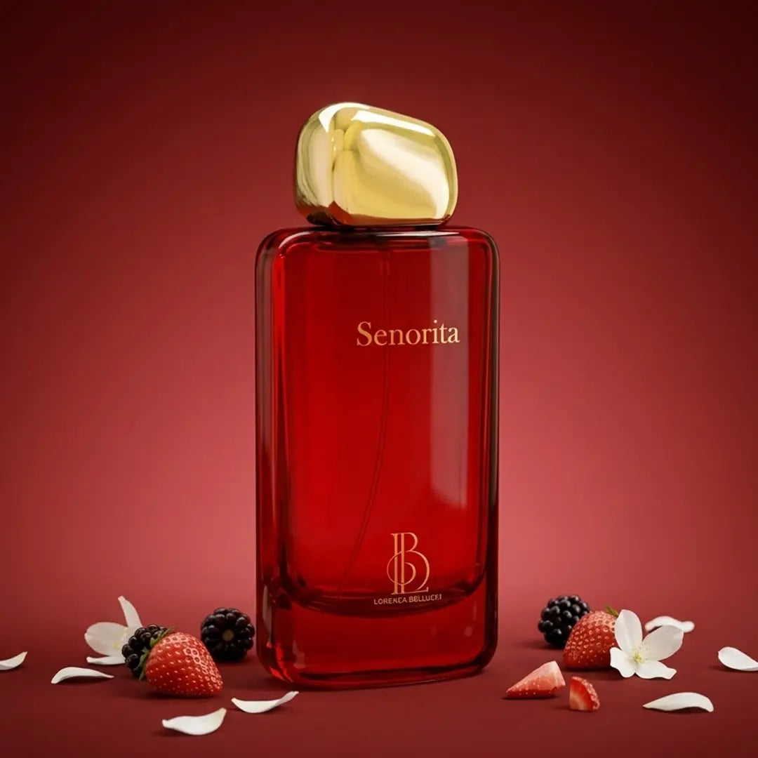 Lorenza Bellucci Senorita perfume with fresh strawberries, blackberries, white jasmine and flower petals on a deep red background